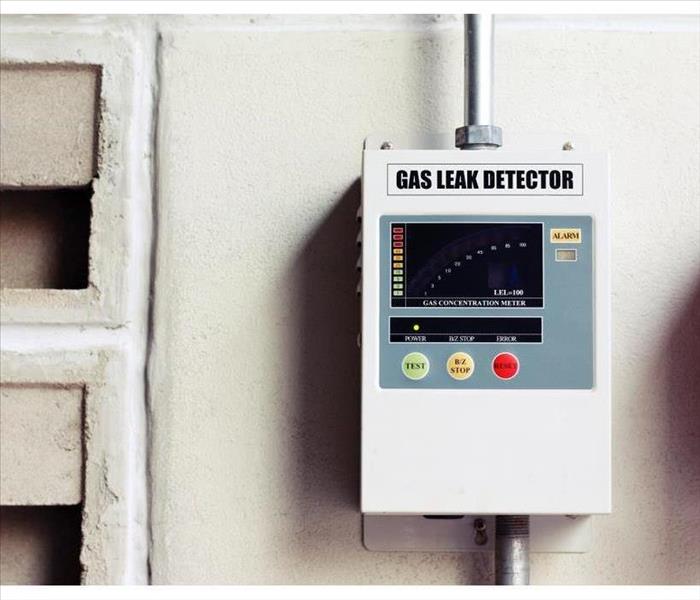 A picture of a gas leak detector on a wall